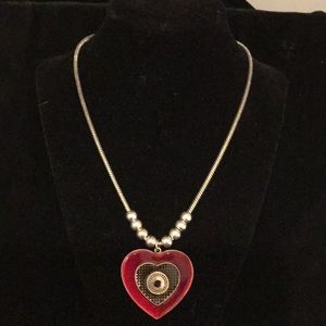 Adjustable enamel heart necklace.
